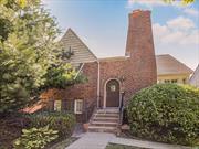 Quaint storybook staggered Tudor in the Huntswood section of Mount Vernon bordering Bronxville. This lovely home features est. 2, 031 sq ft over 3 levels. Entry foyer up to large living room with W/B fireplace, formal dining room w/ french doors to deck, updated eat-in kitchen with SS appliances, granite countertops and door to deck and backyard; up to level 2 primary bedroom, renovated full hall bath, bedroom #2; up to level 3 - bedroom #3, renovated full hall bath, bedroom #4, step up to walk in attic/storage. XL open basement has utility/laundry area w/door to tandem 2 car garage. New back deck is partially covered - perfect for morning coffee. Updates include 2 zone central A/C, roof (4 years old), and Trex Deck (1 year old). Conveniently located near schools (Pennington PreK to 8), parks, transportation, highways, 1 mile to Fleetwood Metro North. Taxes do not reflect STAR discount of $1, 748. Bring your finishing touches to make this your new home sweet home! Shown by appointment.