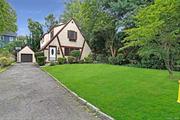 Gorgeous Tudor-style home in the wonderful neighborhood of Edgewood, Scarsdale. Step into the foyer leading into a freshly painted living room with wood-burning fireplace. Brand new modern style kitchen with quartz countertop and top-of-the-range appliances. Open plan layout leading onto a generous size dining area/family room with adjacent powder room. Upstairs is a large primary bedroom with lots of natural light and two additional bedrooms that can fit queen beds. Completely renovated full bathroom with beautiful porcelain tiles- no expense spared on the updates to this pristine house. Central air is another added bonus. The basement has two large size spaces that could be used for a play area and/or office space. Bus to downtown Scarsdale and city trains (35mins to Grand Central) close by. Close to Edgewood elementary school. This is a great opportunity to live in the town of Scarsdale and enjoy all its fantastic amenities including the renowned Scarsdale public pool and state-of-the-art library.