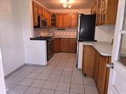 Great 1st floor apartment convenient to all community amenities. Easy access 2 public xport Bus to E, F, J TRAINS + LIRR. Use of back yard permitted and off-street parking available