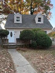 Welcome to your cozy two-story, two-bedroom house. The front has a welcoming porch, leading into a bright living room and a kitchen with room for a small table. Upstairs, two charming bedrooms offer ample closet space. Huge backyard with shed. Washer/dryer in basement.