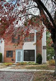 JACKPOT! FIRST FLOOR HOME, JUST STEPS AWAY FROM YOUR PARKING SPOT AND YOU ARE AT YOUR FRONT DOOR ....BONUS...IT&rsquo;S AN END UNIT! Located in Society Hill This home offers a First floor living room with a wood burning fireplace! Open flow into the every day dining area and leads to a large kitchen with sliders to the deck! Lavatory and washer dryer with storage galore under the stairs is also on the first floor! Master En-suite with large walk in closet and a butlers closet with a full bathroom (under renovation) Second bedroom offers a sun drenched room with double closet and a third den area that can easily be a third bedroom! Easy access and close to all major shopping dining and entertainment. Low taxes coming soon.