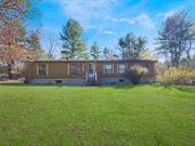 Welcome to your new home or weekend getaway. This spacious mobile home has 4 bedrooms and 2 baths is beautifully set on a level/partially wooded 2 acre property. Home needs work. So bring your own vision to truly make. this place your own. Close to Port Jervis for shops, restaurants, Metro North and Bus Line for easy commute into the Manhattan, the Delaware River for kayaking, rafting and other recreation activities. Near Resorts World Casino, KartRite Water Park and Bethel Woods Performing Arts Center. So bring your tools and make this place your special new home or weekend getaway. House being sold as is.