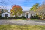 Pastoral Setting. In one of Waccabuc&rsquo;s finest estate areas, four spectacular acres with scenic open meadowlands. Breathtaking setting with fine trees, specimen shrubs and level lawns. Circular drive to charming Country House imbued with character. Beautiful Living Room with random-width hardwood floor and fireplace. Library, finished in rich mahogany, with fireplace and ceiling beams. Formal Dining Room. Country Kitchen open to sun-filled Family Room with fireplace. Three Bedrooms include a First Floor Primary Suite with Dressing Room and Bath. Spacious rear terrace perfect for outdoor entertaining. Separate Guest Cottage with Bath. Potential horse property with Two-Stall Barn and several fenced paddocks. Conveniently located with easy access to town park, schools, shopping and commuting arteries.