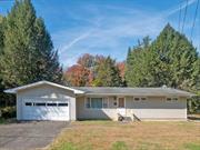 Mid-century comfortable home at the edge of thriving Red Hook Village. Enter a hall that leads to the spacious living room to the left, and the bedroom hall to the right. The large kitchen with eating area, laundry and formal dining room are at the rear. Sliding doors from the dining room open to a large screened porch that leads to a fenced inground pool. Down the hall are three bedrooms, including the primary ensuite and two additional bedrooms with a hall bath. On a nearly two acre lot, with beautiful trees and shrubs, the property is an oasis, just around the corner from all that Red Hook has to offer. Walk to town, and just minutes from Rhinebeck, Kingston, Woodstock and all the Hudson Valley; just under two hours NYC.