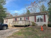 Tucked away on over 10 acres of peaceful woodland, this charming ranch-style home at 64 Big Lake Road invites you to experience a life of tranquility. With 3 bedrooms and 2 bathrooms, the home offers a warm and inviting space where a spacious eat-in kitchen becomes the heart of the home. Imagine waking up in the cozy primary bedroom, stepping into the serenity of your private retreat, surrounded by nature. The property is designed for comfort with modern amenities, including propane heating, and essential appliances. The wooded surroundings provide a natural backdrop for relaxation and outdoor activities, making it the perfect escape from the everyday hustle. Step into a world of peace and privacy schedule your visit today to discover the charm of this hidden gem.