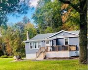 Discover this beautifully renovated 3-bedroom, 1 full bath Ranch, set on over an acre of lush yard space in the Pine Bush School District. Inside, enjoy an updated kitchen featuring granite countertops, stainless steel appliances, and plenty of cabinetry. The formal dining area flows seamlessly into living spaces with gleaming hardwood floors. Step outside to large front and back decks, perfect for relaxation, entertaining, and taking in the expansive, private yard. Recently updated with a new septic system, upgraded 200-amp electric service, and a roof in excellent condition, this home combines comfort with peace of mind. Located close to schools, dining, wineries, hiking trails, and more. This home offers the perfect blend of tranquility and convenience. Schedule your showing today and make it yours!