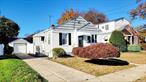 Turn Key Move Right In. Ranch, Carle Place School District, New Eat in Kitchen, Updated Bathroom, Two Bedroom, Private Yard, Detached Garage, Close to LIRR, Shopping, Park. Hardwood Floors, Attic Storage, Front Porch.