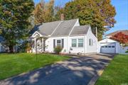 Sunny and bright cape on quiet dead end street in Carle Place School District. There is a living room, with built-ins, a formal dining room, updated eat-in kitchen with tile floors, loads of granite counters, glass cabinet door accents, tile backsplash and cathedral ceiling. Additionally on the main floor are two bedrooms and an updated tiled bath. Upstairs are two additional bedrooms and another beautiful full bath. Great features include, ductless AC units, built-ins, updated baths, pantry storage, washer & dryer, covered patio, fenced yard with sprinkler system, vinyl siding, 1-car detached garage. Nice neighborhood location, yet close to all central Nassau has to offer including shopping, dining, entertainment, fabulous parks & recreation, LIRR, major parkways and a half hour to Long Island&rsquo;s famous South Shore beaches.