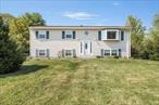 Wonderfully maintained home with an easy commute to Metro North, the Taconic Pkwy, Route 9 and Route 84. Also convenient to shopping, restaurants, the Rail Trail and more of what the Hudson Valley has to offer. This three bedroom Raised Ranch boasts natural light throughout, hardwood floors and over an acre of land. Inside you will find a kitchen with lots of counter space, including a breakfast bar, dining room with updated lighting and a beautifully finished basement with 1/2 bath. The backyard is perfect for entertaining. It is fully fenced in with a large deck, above ground pool, shed and plenty of space to play. Make your appointment today!