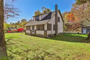 Beautifully Maintained 1927 Farmhouse in Rosendale. Nestled between Kingston and New Paltz, on the outskirts of the Rosendale, rests this charming 1927 farmhouse. While it has been modernized for today&rsquo;s amenities, it maintains its individuality while being situated in a prime location, offering the perfect blend of tranquility and convenience. Enjoy the proximity to Fourth Lake, grab your kayak and hit the water or head on over to the scenic Wallkill rail trail and marvel at the breathtaking panoramic views from the Rosendale Trestle. Just a stone&rsquo;s throw away, downtown Rosendale awaits with its array of restaurants, shops, and a vibrant weekly farmers market. Step inside this lovingly maintained farmhouse to discover a host of desirable features. Picture morning coffee, afternoon lunch or evening cocktails in one of the home&rsquo;s several outdoor living spaces  from the concrete side patio, to the back deck and enchanting enclosed front porch just off the living room, every corner exudes warmth and character. The property has mature trees, a private driveway, and a small shed perfect for outdoor equipment and firewood storage. The farmhouse features a wood-burning fire stove and coffured ceiling in the living room, original hardwood floors, and an abundance of natural light. The kitchen, complete with bamboo floors, opens to a spacious dining area and a mudroom with discreetly hidden washer and dryer. The first floor also hosts an oversized full bathroom. Upstairs, you&rsquo;ll find three bedrooms with beautiful hardwood floors and a half bath. The smaller bedrooms are currently cleverly designed as offices with oversized closets, atypical for the age of the home. One of the most unique and exciting features of this property is the oversized garage space, capable of accommodating multiple vehicles and outdoor machinery. Think cars, trucks, boats, bikes, kayaks, ATVs, SUVs, and snowmobiles. The studio above the garage offers endless possibilities and potential whether you dream of a home office, art studio, dance space, or yoga sanctuary, this versatile area can fulfill your creative desires. Recent upgrades include: Brand new roof, freshly painted exterior, several recently replaced windows and a newly repointed chimney offering fresh and confident start to your next chapter. 10MPH or less on 4th Binnewater PLEASE