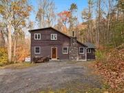 Nestled in the heart of Mount Tremper, a hidden gem in the Town of Shandaken, Cedar Rest awaits; a tranquil mountain retreat perfectly tucked into the forest. Down a private gravel drive, this thoughtfully renovated sanctuary blends rustic charm with modern convenience, with all the mechanicals, insulation, plumbing, and electric being just a few years old. Inside, the home has rich oak floors that create an organic, cozy vibe throughout. The first floor serves up a spacious bedroom, a full bath, laundry, and a kitchen with ample storage. The main gathering spot is the great room, where a wood-burning stove with massive stone surround anchors the space, making it ideal for winter nights in. Head upstairs to discover two more roomy bedrooms and another full bath, ready for all the guests who will inevitably flock to your forest hideaway. Outside, the magic continues with seasonal mountain views and a seasonal babbling creek along the property&rsquo;s edge. The courtyard will become your go-to spot for summer evenings under the stars. There is another small stone foundation behind the home which could be converted into a shed or studio. Peace and seclusion define this quintessential Ulster County home, yet you are only a 15-minute drive away from Woodstock&rsquo;s vibrant Tinker Street. Whether it is the slopes at Belleayre, Phoenicia-Mt. Tobias Wild Forest, Ashokan Rail Trail and Reservoir or Tremper Mountain and Fire Tower, adventure is always around the corner at Cedar Rest. Just over two hours from NYC, this low-maintenance retreat offers the perfect balance of solitude and comfort. Call now for your private tour!