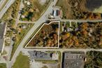 Commercial property 2.26 acres frontage on 3 roads strategically situated with prime exposure, high visibility in the village water and sewer district across the street from the gas station, and next to the car wash by the formally Apollo plaza, the highway exit 106 circle and stone throw from the Resorts World Catskills, Kartrite Water park , near major car dealerships in the East Broadway gateway district with many uses and opportunities.