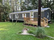 Charming and cozy mobile home within minutes of Bethel Woods, Callicoon and Narrowsburg, NY. Easy access on a well maintained Scenic By-Way. Features new appliances (2023) new well pump (2023), New Furnace (8/2024) and 2 new decks. Includes new framing, insulation and skirting. 2x4 construction. Ceramic floors in kitchen and full bath, carpet in bedrooms and living room. Currently Air BnB. Owner is a licensed real estate broker.