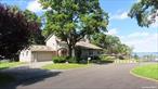 For the executive that wants it all, this custom builderâ€™s house has it and more. Located in desirable, safe, Cornwall-on-Hudson, with river and mountain views, this is a must see house. Well situated on a level &#189; acre plus, enjoy soaking up the views. Some of the many features include; SS apps., Granite CT, vaulted ceilings, promenade hall/stairs, wood efficient fireplace, ledge stone hearth, outside screened in Hot Tub, Basement Entertainment Center with extended bar, band stage, dance floor and pool table area. In total, 3600 square feet, 3 bd., 3 &#189; bath, an o/s 2 car garage, central AC, 200 amp service, city water and sewer, within village restaurants/shops. Hiking, biking and river water sports are also nearby. Access to NYC via Metro North. Possible Financing. Your search for the exceptional has ended.