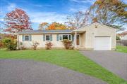 Enjoy easy living in this 3-bedroom ranch near the beach in Shirley. Featuring a bright living room, an eat-in kitchen, and a cozy den with a fireplace, this home has a warm, inviting feel. Outside, a fully fenced, spacious backyard offers plenty of room to relax or entertain. With recent updates like a new roof and windows, this home delivers excellent value and plenty of potential-truly a bang for your buck.