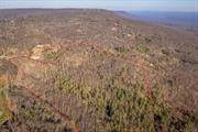 A nature-filled land offering in the charming historic hamlet of Cragsmoor. 31 private acres, once part of the 350- acre estate called Chetolah owned by the artist George Inness Jr. is ready for its next owner. The property is located on-top the Shawangunk mountain range with multiple land preserves, the largest being 5000-acre Sam&rsquo;s Point which is hiking distance from the parcel. With some selective tree clearing there would be stunning south and south-west views. A soothing stream called the Platte Kill that is flanked by rhododendrons and meanders through the lower portion of the property is an ideal spot to place a gazebo and enjoy the many dipping pools. An old roadbed is still intact and usable when considering possible house sites. There is frontage stretching on both Cragsmoor and Vista Maria roads. There are multiple scenic spots for homesites that offer privacy and serenity. Within 2 hours of the GW bridge makes this a great weekend retreat or use full time.