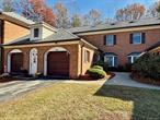 Welcome Home to the desirable Stony Brook Complex. First Floor One Level Living at its BEST in this Stony Brook garden unit! This 2 bedroom 2 full bath ground floor townhouse style home with attached one car garage and driveway parking is maintenance free living. The tiled entry leads to the sunken living room, spacious dining area and open kitchen with peninsula counter tops. This unit is in a perfect location for non maintenance living and yet privacy. The back patio/deck overlooks the natural space in rear of property. The master bedroom has a Hollywood style vanity area in addition to the full master bath. The walk in closet also has access to the stairs down to crawl (4 to 5ft high) dry storage basement. An additonal full hall bath and second bedroom complete the floorplan. Arched doorways, trey ceiling, crown molding and custom lighting. Water/Sewer, landscaping, snow removal, trash, community amenities all included in HOA. The community club house, pool and tennis courts is just a few doors down from this unit. This complex is tucked away in an executive suites complex. Yet minutes to all major shops, restaurants, and interstates.