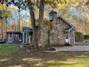 Artists, writers or just plain want to get awayers! Storybook stone cottage has it all! 4.8 acres of total serenity & seclusion. 1 BR, 1 bath, LR w/cathedral ceilings, exposed beams & fplc w/wb stove insert, wood flrs in LR & BR. Newer kitchen w/Silestone counters, tile floors. Primary bedroom with French doors to screened porch. Level & cleared. Full of surprises each season! New asphalt driveway. Subject to credit report, credit score of 700 or better, proof of income & references. Tenant pays all utilities including lawn care, snow removal, garbage removal. Seasoned wood only for wood burning stove insert. Absolutely no pets! Landlord is looking for an 18 month lease agreement.