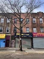 Brick 2 Residents and 1 Restaurant Property for sale. Nice location close to all.Clear title. Deliver Vacant.