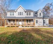 Welcome to this stunning 4-bedroom, 3-bath colonial, only 2 years young!! This home features 2.5 acres of privacy and picturesque land. Gorgeous hardwood floors throughout the house and abundant natural light add warmth to every room. Upon entering, you are greeted by a lovely foyer, spacious office, living room, and a formal dining room. The eat-in kitchen is equipped with stainless steel appliances, an island and quartz countertops. Upstairs, discover a wonderful primary bedroom with a walk-in closet and primary bath. Three generously sized bedrooms and a beautifully appointed full bath. Lots of storage closets! Outside, enjoy the inviting deck and backyard, perfect for outdoor activities and gatherings. This home effortlessly blends comfort, style, and functionality, making it the perfect sanctuary. Enjoy everything the Hudson Valley has to offer!