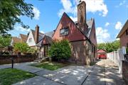 Welcome to this exquisite Tudor-style single-family home located in the highly sought-after neighborhood of Jamaica Estates, Queens. This charming residence seamlessly blends classic architecture with modern amenities, offering a perfect sanctuary for discerning buyers. Key Features: Modern Upgrades: Enjoy peace of mind with an array of recent updates including an expensive slate roof, state-of-the-art boiler, updated electrical and plumbing systems, and a new sewer system. Enhanced Exterior: The home&rsquo;s exterior shines with new siding and windows, ensuring energy efficiency and curb appeal. The updated garage provides ample space for parking and storage. Eco-Friendly Living: Equipped with solar panels, this home offers sustainable living while reducing energy costs. Interior Excellence: Inside, you&rsquo;ll find beautifully restored hardwood floors that add warmth and elegance to the spacious living areas. The thoughtfully designed layout provides a perfect balance of formal and casual living spaces. Comfort and Convenience: Each bedroom offers generous closet space and natural light. The bathrooms have been tastefully renovated with modern fixtures and finishes. Prime Location: Nestled in a tranquil, tree-lined street, this home offers the serenity of suburban living while being just a short distance from vibrant shopping, dining, and entertainment options. Excellent schools and parks are also within easy reach. Outdoor Retreat: The beautifully landscaped yard provides a private oasis for relaxation and entertaining. Whether hosting a summer BBQ or enjoying a quiet evening under the stars, this space is sure to delight. Don&rsquo;t miss the opportunity to own this magnificent Tudor home in one of Queens&rsquo; most desirable neighborhoods. Schedule a private showing today and experience the perfect blend of historic charm and modern luxury.