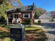 Classic Elegance with a touch of Country Charm, featuring 3 Large bedrooms, 2 full baths, formal dining room, Living room with fireplace, spacious den, eat in kitchen.** hardwood floors throughout** full basement finished with work room, den, laundry room and plenty of storage. Oversized Det. 2.5 det garage, driveway fits 4 cars, Backyard sanctuary, fenced yard extra lot provides privacy **Prime location convenient to shopping, and major highways. **New Roof** dual pane windows, ductless a/c unit, high efficiency water heater, fireplace has gas log w/remote, hardwood floors, central vac 5 sunny skylights