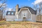 Explore the potential of this unique Geodesic Dome Home on 3.2 acres within the Valley Central School District. This 2-bedroom, 1-bath home also features an additional room that could serve as an office or an extra bedroom. While the home requires renovation, it is very solid and offers a fantastic opportunity to customize a one-of-a-kind structure on a spacious lot. With its distinctive design and ample acreage, this home invites creativity and vision to make it truly special. Enjoy the privacy of rural living while being within a short drive of local amenities and one mile to Route 17K and close to I-84. Schedule a viewing to envision what this dome home could become