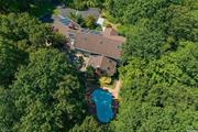 BEST VALUE in Cold Spring Harbor S.D #2. Aspirational address in a 2+ acre, $4 million--$7 neighborhood only .66 of a mile to Inc. Village of Laurel Hollow Beach with dock. This 6700 sq. ft. newly (2021) renovated Colonial enjoy a full house elevator, high ceilings, in-ground 16 Ft. deep gunite pool, open floor plan.(See Floor Plans) World Class full house water filtration system. A home office completes this bucolic offering.