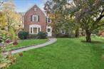 This stunning four-bedroom center hall brick colonial combines classic elegance with modern updates. Step inside to a spacious, light-filled eat-in kitchen, enjoy a large island that invites culinary creativity and family gatherings. The open layout flows into the inviting dining room w/ built-ins, perfect for hosting dinner parties. Relax in the cozy living room, where a warm fireplace sets the tone for intimate gatherings and cozy nights in. Need some fresh air? The charming screened porch overlooks your private .40-acre yard, offering a tranquil retreat for morning coffee or evening relaxation while the kids play. Venture downstairs to find a playroom in the basement, ideal for movie nights or a home gym whatever suits your lifestyle! Plus, the attached two-car garage provides ample storage and convenience. Located in the Brook Neighborhood, you&rsquo;ll enjoy walking to the nearby Murray Elementary School, making school runs a breeze. Additional Information: ParkingFeatures:2 Car Attached, Appliances: Electric Water Heater OtherEquipment: Generator,