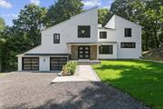 Better than NEW! Located on a private 4.35-acre lot at the end of a secluded cul-de-sac, 43 Rock Gate Farm Road in Bedford, NY, is a stunning contemporary-colonial home boasting 4, 700 square feet of living space. New new roof, new A/C system, new energy-efficient windows, new heating system. Amenities include a heated two-car garage and luxurious primary bedroom suite with a walk-in closet, spa-like bathroom with oversized soaking tub. There are two additional bathrooms and a den, (lives like a four bedroom) and a spacious design perfect for both relaxation and entertaining. The interior is highlighted by cathedral ceilings, new hardwood floors, and an open floor plan. A deluxe center-island kitchen connects to a breakfast room that opens onto a wraparound Trex deck. The family room, adorned with a stone fireplace, provides a cozy gathering space, while the grand foyer is ideal for hosting or displaying art. Conveniently located near Mount Kiscoâ€™s town center, major highways, and the train station, this property combines tranquility with accessibility, surrounded by multi-million-dollar estates and horse farms.