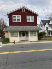 This is the perfect investment opportunity. This building in Port Jervis, NY consists of an office on the lower level that could be used as a retail space, and two 1-bedroom apartments on the upper level. Each apartment has its own private entrance and separate utilities which include natural gas heat, municipal sewer, and municipal water. The building does need some work, but is located within walking distance to shopping, school, restaurants, and the train to NYC.