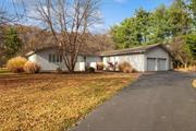 This extraordinary ranch mimics mid-century modern! Situated on a level 1.7 acre lot peppered with a orchard of Peach, Pear and Apple trees. Spring blooms will provide a bounty of fruit! The minute you enter the over-sized foyer, you know you have found a true gem! This sprawling home has had everything updated/replaced thru the years. The wood floors glisten and reflect all the natural light from copious amounts of windows. Living room features a wood-burning fireplace w/exposed brick and built-ins that open to a stunning dining space. A screened porch off of foyer is magical with its scenery. Sliding pocket doors open to a spacious modern kitchen that features a double oven and high-end appliances. Anigre hardwood cabinetry frames granite counter tops and affords a plethora of storage! Entertaining will be a breeze! Bedrooms generously sized with 2 nicely appointed full baths. Mostly finished basement provides endless possibilities along with work spaces galore! Patio space is awe-inspiring!  Don&rsquo;t forget the over-sized 2 car garage! This home is a TRUE jewel to experience! You will not be disappointed!