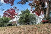 This stunning Victorian Georgian Colonial Revival home, featuring Greek architectural elements, is set on a double lot totaling 1/3 of an acre. The property includes a detached two-car garage at the end of a long private driveway with space for 10+ cars, potential to subdivide for another house. With approximately 4, 500 square feet of living space, this meticulously restored and well-maintained home boasts 6 bedrooms, 3.5 bathrooms, and a full semi-finished basement, along with a detached two-car garage. The grand entry foyer opens to a formal dining room and two pantries, including a butler&rsquo;s pantry. The home features three fireplaces one each in the living room, family room, and master bedroom. Enjoy a large enclosed porch with dual doors leading to the patio. The modern kitchen includes granite countertops, stainless steel appliances, a full pantry, a separate butler&rsquo;s pantry, and connects to the formal dining room. Hardwood floors throughout. The second floor includes a spacious master suite with an en-suite bath, plus three additional bedrooms and another full bathroom. The finished third floor offers two more bedrooms and an additional full bath. The home&rsquo;s plumbing, electrical, and bathrooms are ready for customization by the new owner. Exquisite original woodwork has been fully restored throughout. Additional Information: ParkingFeatures:2 Car Detached,