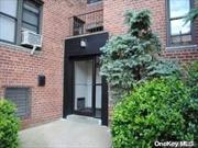 Very Sunny Corner Unit, Feature Living Room, Dinning Area, 1 Bedroom, 1 Full Bathroom. The unit has Kitchen Floor recently renovated. Laundry in the basement. Close proximity to the LIRR and steps away from the Q28 to Main St. Flushing. and all other transportation as well as being close to ALL shopping. MUST SEE!!