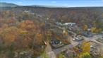 Location, location, location! Formerly the Rock Cliff House inn and tavern. This unique property offers an exceptional opportunity to transform a historic structure into a grand one- or two-family residence in the heart of High Falls, NY. Positioned at the edge of charming main street, this building is set on 5 beautifully wooded acres with dramatic rock outcroppings. Just 90 miles from Metro New York and short drives to New Paltz, Kingston, and Woodstock, this location is perfect for those seeking a walkable weekend retreat or a full-time residence with easy access to the best of the Hudson Valley. This property, steeped in history, awaits a complete renovation to restore its former glory, offering an inspiring canvas for those with a creative vision (and proper approvals). With its prime location and architectural charm, this building presents the rare chance to create a distinctive residence that blends modern comforts with timeless character. Celebrate the rich heritage of High Falls and the scenic beauty of the Hudson Valley, all while enjoying the convenience of being at the heart of a vibrant, welcoming community. Bring your dream to life in one of New York&rsquo;s most charming destinations!