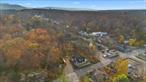 Location, location, location! Formerly the Rock Cliff House inn and tavern. This unique property offers an exceptional opportunity to transform a historic structure into a grand one- or two-family residence in the heart of High Falls, NY. Positioned at the edge of charming main street, this building is set on 5 beautifully wooded acres with dramatic rock outcroppings. Just 90 miles from Metro New York and short drives to New Paltz, Kingston, and Woodstock, this location is perfect for those seeking a walkable weekend retreat or a full-time residence with easy access to the best of the Hudson Valley.  This property, steeped in history, awaits a complete renovation to restore its former glory, offering an inspiring canvas for those with a creative vision (and proper approvals). With its prime location and architectural charm, this building presents the rare chance to create a distinctive residence that blends modern comforts with timeless character. Celebrate the rich heritage of High Falls and the scenic beauty of the Hudson Valley, all while enjoying the convenience of being at the heart of a vibrant, welcoming community. Bring your dream to life in one of New York&rsquo;s most charming destinations!