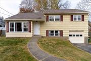 Nestled in the Town of Poughkeepsie, this charming 3-bedroom home offers a perfect blend of comfort and functionality. Boasting 1, 792 square feet of living space, the home features an abundance of natural light that bathes the hardwood floors in a warm glow. The kitchen offers ample storage and features a window with a view of the backyard. Experience the tranquility of a peaceful cul-de-sac and the seclusion of a spacious fenced backyard. The finished basement provides additional recreational space, while the one-car attached garage adds convenience. Located in the highly sought-after Spackenkill School District, this home is not just a place to live but a wonderful environment to grow.