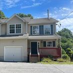 Looking for a solid investment in the Minisink Valley School District? This newer townhouse (Unit 2C, right side) is tenant-occupied with a lease in place through September 30, 2026, offering immediate income of $2, 850/month. Tenants pay for oil and electric, are responsible, and come highly recommended. Privately set, this bright and welcoming home features an open foyer leading into an updated kitchen with Quartz/Quartzite countertops and plenty of crisp white cabinetry. Natural light floods the spacious dining and living room, where you&rsquo;ll find beautiful flooring and a large closet perfect for pantry use. Step out onto the updated deckâ€”ideal for summer barbecues. Upstairs, the home offers three generous bedrooms and two full baths. The primary suite easily fits a king-size bed, boasts a walk-in closet with built-in shelving, and includes a private en-suite bath. The two additional bedrooms feature oversized closets and share a hall bath. A washer and dryer are conveniently located on the second level, along with the same stylish flooring. A spacious unfinished basement perfect for storage. Additional highlights include a one-car garage and a large additional parking area for up to 10+ vehicles.  This quiet, safe, and intimate HOA community has only four units. **Whether you&rsquo;re an investor seeking consistent rental income or planning ahead for future personal use, this is a property worth your attention.** Monthly HOA fee ($450) covers insurance, exterior home maintenance; snow removal, lawn maintenance, and trash. Schedule your showing today!