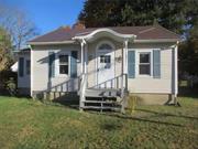 Commuters Dream! Minutes to I-87! This 2 bedroom 1 bath ranch will be a perfect starter or down-sizer. Hardwood flooring on 1st floor. Natural light fills the living room & dining area. Brick fireplace for those chilly nights. Huge kitchen with plenty of counter & cabinet space. Level back yard & deck for entertaining. Plenty of parking in your 2 car garage. Close to shopping at Woodbury Commons & I-87. Additional Information: HeatingFuel:Oil Above Ground, ParkingFeatures:2 Car Detached,