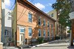 Discover this well-maintained and thoroughly cherished classic 2-family brick home in central Astoria. Located just one block from Broadway and two blocks from the N/W subway stop, this historic gem was built in 1910 and is coming to market for the first time in decades. Treasured by its current owners, this fully detached home features windows on all four sides, flooding every room with natural sunlight thanks to its sunny southern orientation.  The home retains its original decorative cornice and boasts charming architectural details and high ceilings throughout. Each of the two equally sized units offers a 4-room layout, providing comfortable, character-filled living spaces. The property also includes a dry basement with impressively high ceilings, ideal for additional storage or customization. Whether you&rsquo;re seeking rental income or envision converting it to a single-family residence, this versatile home offers endless possibilities. Don&rsquo;t miss this rare chance to own a meticulously cared-for piece of history in a prime Astoria location!