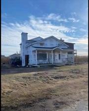 Large victorian home on a corner lot with second floor beautiful water views. House is gutted and must be lifted. Quiet neighborhood. Home is being sold as is. Perfect for an investor.