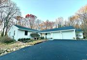 This immaculately renovated Ranch is set on 2.86 acres on a quiet, tree-lined street. This charming residence boasts a bright and airy formal living room with a bay window, built-in cabinetry and patio doors. Adjacent is a lovely formal dining room with an additional patio door to the exterior. The thoughtfully remodeled kitchen features custom cabinetry, quartz counters, a farmhouse sink, stainless-steel appliances, a large dining space, laundry area, beautiful powder room, and access to the 2+ car garage.   The master suite offers a spacious bedroom with picturesque views, double closets, and a spa-like master bath. The additional bedrooms are both large with ample closet space, and there is a tastefully appointed hall bathroom with a dual vanity. Highlights include refinished hardwood floors, freshly remodeled kitchen with new appliances and baths with gorgeous new fixtures, plus new windows, doors, roof, and HVAC. This incredible home features park-like property with mature specimen plantings and plenty of space for a pool. Centrally located, this residence is close to historic Cold Spring Harbor and Huntington village which both offer a myriad of restaurants, shopping, parks, beaches, golf courses, yacht and country clubs.