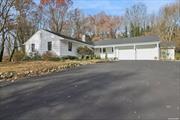 This immaculately renovated Ranch is set on 2.86 acres down a long and tree-lined private road, one-third of a mile off Woodbury Road. Boasting a bright and airy formal living room with a bay window, built-in cabinetry and patio doors, this charming residence also has a lovely formal dining room with an additional patio door to the exterior. The thoughtfully remodeled kitchen features custom cabinetry, quartz counters, a farmhouse sink, stainless-steel appliances, a large dining space, laundry area, beautiful powder room, and access to the 2-car garage. The master suite offers a spacious bedroom with picturesque views, double closets, and a spa-like master bath. The additional bedrooms are both large with ample closet space, and there is a tastefully appointed hall bathroom with a dual vanity. Highlights include refinished hardwood floors, freshly remodeled kitchen with new appliances and baths with gorgeous new fixtures, plus new windows, doors, roof, and HVAC. This incredible home features a park-like property with mature specimen plantings and plenty of space for a pool. Centrally located, this residence is close to historic Cold Spring Harbor and Huntington village which both offer a myriad of restaurants, shopping, parks, beaches, golf courses, and boating options. RE Taxes $21, 551.82 Road Fee $750. /Quarter, Additional information: Appearance:Mint