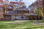 Beautiful, large home with midcentury modern design and vaulted ceilings. Located on wooded and private .92 acre. Featuring a very spacious newly renovated kitchen as well as private beach access at North Shore Beach Association. Must see this lovely home to truly appreciate! More photos coming soon.