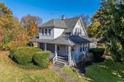 Welcome to this classic Colonial centered in the heart of the charming community of Greenlawn Village with a quaint, timeless appeal. A distinctive 1900s home standing proudly on a sizable piece of land, full of character waiting for your love and renovations. The welcoming front porch leads to a spacious light-filled front entry. The principal rooms are generously sized, offering high ceilings and mainly hard wood floors. Enjoy the eat in kitchen overlooking the beautiful property. The main floor also includes a convenient laundry area. What truly sets this property apart, though, is its location. It&rsquo;s one of those rare properties where you&rsquo;re just a short 2 blocks away from the heartbeat of the village. Easy access to local shops, restaurants, and community events, while still enjoying the privacy and tranquility. This property is one acre. with both .50 lots, you can enjoy a large, flat parcel of land in a special location with endless possibilities to renovate or expand or simply enjoy the privacy and beauty it provides. In addition, the separate lots each have their own tax map number and taxes, offering the possibility for future development for subdivision with the proper permits. Whether you want to expand your home or explore other investment opportunities, this property offers flexibility and long-term potential. A detached garage adds even more convenience, whether for storage, a workshop, or additional parking. Harborfields SD 6.