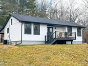 Welcome to this stunning ultra-modern Ranch in Accord, NY. As you arrive, you&rsquo;ll immediately notice the striking new board and batten siding, enhanced by stylish black accents on the windows, fascia, and doors. The thermal bluestone patio, runs the length of the home, allowing you to enjoy the outdoors all summer long.Step inside the main house and youâ€™ll find a completely remodeled interior, thoughtfully designed with beautiful finishes. The living and dining areas connect effortlessly to a stylish island kitchen. The open vaulted ceiling kitchen is outfitted with premium black Zline Italian made appliances, quartz countertops, and luxurious gold fixtures, including a pot filler, faucet, and recessed lighting throughout that add an elegant touch. The French doors with built in privacy shades open up to the brand new trex deck and mountain views.The main level also offers two bright, airy bedrooms, including the primary suite, each equipped with California closets. All full baths showcase modern elegance with sleek vanities and smart self-cleaning toilets with bidets and heated seats. Downstairs, discover a flexible third bedroom and another full bath. The lower level also provides a spacious area perfect for a family room or media center with its own separate walkout access and a convenient laundry room. Thermal bluestone steps lead you up to the additional studio space which includes itâ€™s own heat, half bath, and spray foam insulation storage space above ready for use. This private oasis is 90 miles from Manhattan, via exit 18 on the NYS Thruway, offering a unique combination of privacy, nature, and convenience to all the local amenities the Hudson Valley has to offer including golfing, hiking, skiing, apple picking, breweries, and so much more. Nearby attractions include Inness Resort, Westwind Orchard,  Arrowood Farms and Brewery, Minnewaska State Park, Mohonk Mountain House, and the Ashokan Reservoir.If youâ€™re looking for a modern home that combines luxury with low-maintenance living, this is the property for you. This exceptional home must be seen to be fully appreciatedâ€”you wonâ€™t be disappointed!