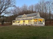 **Stunning Mountain Views & Spacious Living** Experience breathtaking mountain views from your covered porch with a charming gazebo, perfect for enjoying your morning coffee or evening drink. This former carriage house, set on over 4 acres of beautifully cleared and wooded land, offers a serene retreat while still being close to shopping, dining, and places of worship. The expansive composite front porch provides the ideal space for entertaining or simply relaxing while taking in the scenic vistas. Step inside to a bright and welcoming tiled foyer that leads to a sunken living room, featuring a large space for entertaining your guests. The dining room is perfect for large gatherings and opens to the gazebo. The efficiently designed kitchen boasts custom cabinetry, stainless steel appliances, recessed lighting, granite countertops, and a convenient peninsula with seating. A large pantry, two coat closets, and a half bath complete the first floor. Upstairs, you&rsquo;ll find a cozy family room with hardwood floors and skylights, leading to a loft-style bed area. The second bedroom is conveniently adjacent to the full bathroom, while the spacious master suite offers double closets and a master bath with a soaking tub and stand-up shower. With high-speed internet throughout, this home is ideal for modern living, whether for work or play. Located just minutes from Livingston Manor, Liberty, Jeffersonville, and attractions like Kartrite Water Park, Resorts World Casino, Villa Roma Resort and Golf Course, and Bethel Woods Center for the Arts. Only a two-hour drive from the George Washington Bridge, and a short distance from local restaurants, bars, bakeries, and essential businesses. Make this peaceful mountain retreat your own