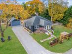 Welcome to the Shipwright&rsquo;s Cottage in East Quogue, where charm and modern convenience blend seamlessly in this two-bedroom, one-bath home. Built in 1932, this inviting property offers a cozy yet spacious environment for anyone looking to enjoy a slice of Hamptons paradise. Located South of the highway, this home is part of a rare, quiet, and bike-friendly neighborhood. Imagine starting your mornings with a leisurely stroll to the vibrant yet quaint town of East Quogue, alive with year-round shops, tantalizing restaurants, farm stands, and a bustling calendar of community events. Move inside to discover an interior that exudes warmth. The open layout ensures a delightful flow from room to room, accentuated by soft, neutral tones and rich wooden flooring and thoughtful accents. Plenty of natural light pours through large, elegantly trimmed windows, creating a bright, inviting ambiance with each window framing views of the lush greenery. Beyond the walls, your private yard offers a fenced yard, making it a safe haven for pets and a lovely space for gatherings or quiet reflection. A detached garage, full of potential, stands ready to transform into your dream studio or a charming party barn. For the green thumbs, a large garden shed with a potting area and raised vegetable beds is waiting for you to cultivate your passion for plants. The location is anchored by historic homes lining the surrounding streets, with easy access to train services and 27 East to help you sidestep the Hamptons traffic. Boating enthusiasts will relish the proximity to two established area marinas and the East Quogue marine park, providing effortless access to water recreation. With projects like the historic Hampton Shipyard and The Hills Luxury Golf Course, the area promises excitement and potential growth. This property isn&rsquo;t just a home; it&rsquo;s a lifestyle., Additional information: Appearance:Excellent, Separate Hotwater Heater:1