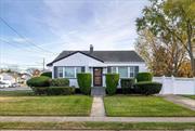 Welcome to this Beautiful Split-Level Home in the Lindenhurst Village on a 75 x 100 Corner Property Featuring 3 Bedrooms, 1.5 Baths, Living Room or Dining Room with Cathedral Ceiling and Wood Flooring, Eat In Kitchen, Huge Den/Family Room with Walk-Out Exit to Yard, Newly Updated Electric, All New Windows and Window Treatments, Gas Heat, Central Air, In Ground Sprinklers. Taxes with STAR $10, 467., Additional information: Appearance:Excellent, Separate Hotwater Heater:Y