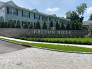 Rare opportunity to own a pristine corner unit in Breton Hills! Affordable luxury in a 55+ community in Glen Cove. This beautiful SECOND story unit boasts an open floor plan, cathedral ceilings in the Living/Dining area, Sunny windowed kitchen with stainless steel appliances and granite countertops. The Large Primary Suite also has a cathedral ceiling, WIC, and a windowed bathroom with shower. The second bedroom has a WIC, and 9 foot ceilings. Additional Full bath with shower Full size washer/dryer and much more! 2 parking spaces (one assigned). Amenities Include: Clubhouse, Gym, and Bocce Ball Court., Additional information: Appearance:Diamond, Interior Features:Lr/Dr, Min Age:55